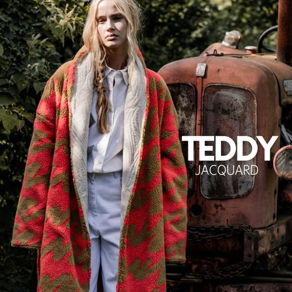 Tejido teddy jacquard tostado y naranja