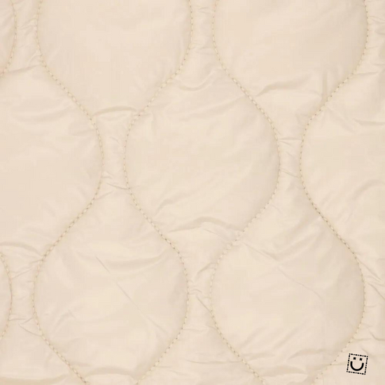 Tela acolchada impermeable beige